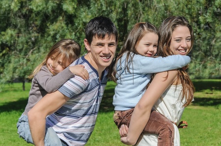 Happy Family In Parkの写真素材