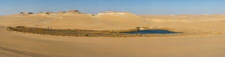 Oasis in Sahara desert in Egypt, blue lake in desert big size panoramaの写真素材