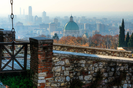 The dome of the Duomo Nuovo cathedral, skyline in Brescia Italyの写真素材