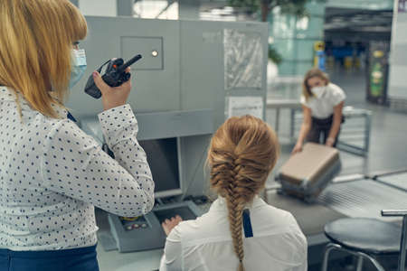 Young female person working with radio setの写真素材