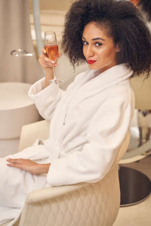 Fashionable Afro American female enjoying weekend in spaの写真素材