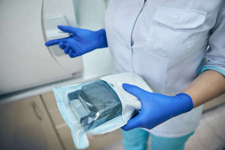 Surgical and dentistry equipment in assistant hands