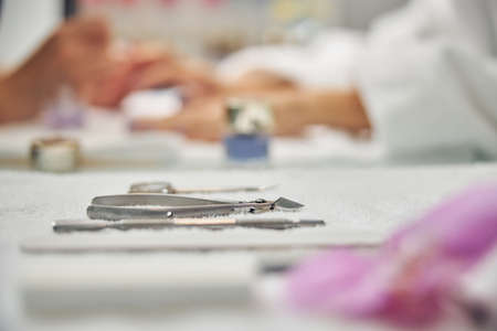 Manicure office with tools during client visitの写真素材