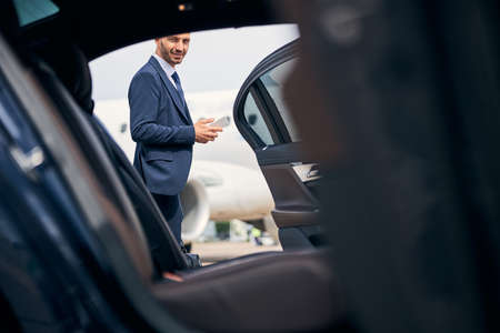 Male traveler ready take a taxi from the airport