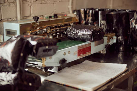 Automated packaging machine for coffee at factoryの写真素材