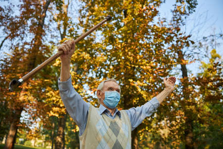 Happy smiling senior man feeling happy in the outdoorsの写真素材