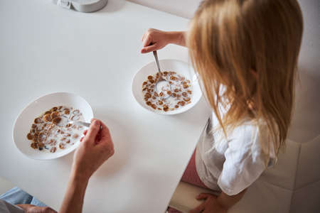 Dinner table with two plate with tasty meal for morning breakfast