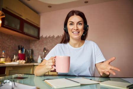 Lady with a teacup asking for explanations
