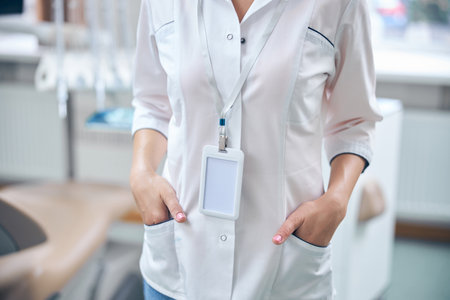 Female dentist waiting for patients in hospital