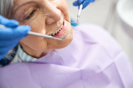 Assessment of old person teeth with dental devices
