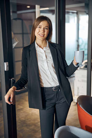 Office worker dressed in business attire looking aheadの写真素材