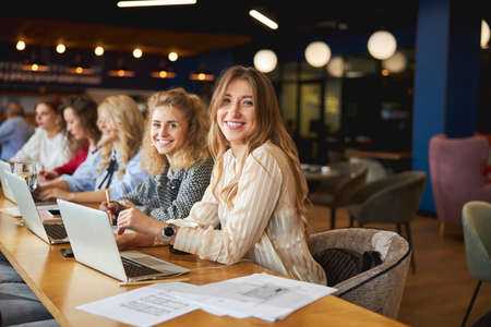 Cheerful creative team working on new business projectの写真素材