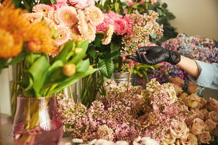 Professional florist selecting flowers for a spring bouquet