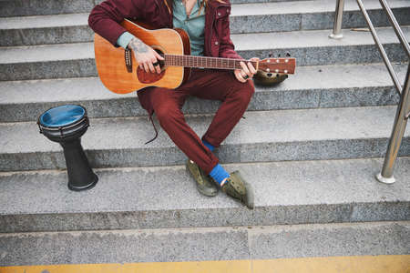 Close up of young musician creating music