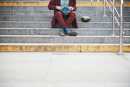 Focused photo on man relaxing with Djembeの写真素材