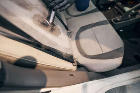 Professional cleaning and detailing service. Steam sterilizing of seatの写真素材