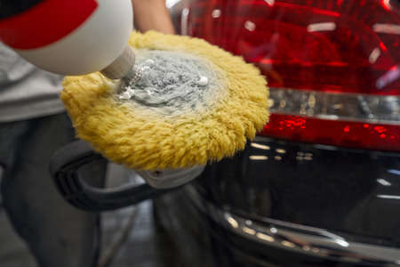 Auto detailing of car backlight on carwash serviceの写真素材