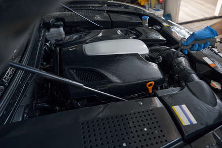 Manual car wash engine with pressure water in auto service