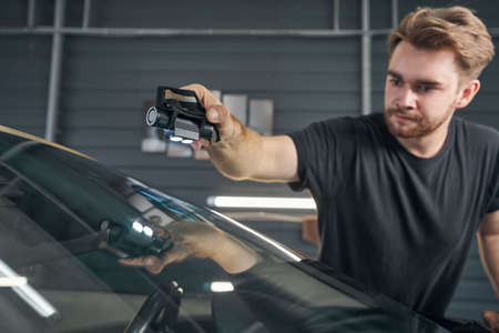 Service master control cleaning during auto detailing at maintenance stationの写真素材