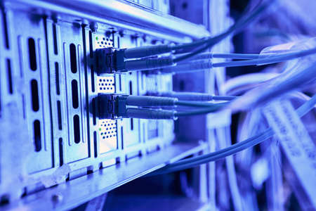 Data center network server connected to router using  cablesの写真素材