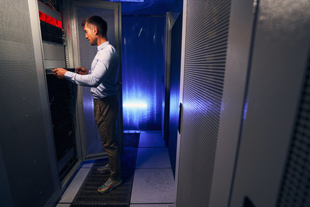 Expert Caucasian system administrator doing hardware refreshの写真素材