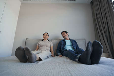 Bored mature couple during quarantine at home