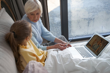 Health issues of little girl being resolved with online consultationの写真素材