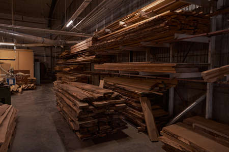 Focused photo on wooden plates being in workshop
