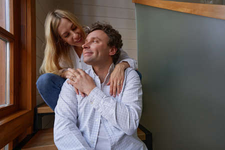 Close up of pleased woman caressing her man