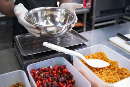 Chef preparing ingredients for baking at the kitchen