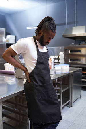 Adult chef resting after day at work
