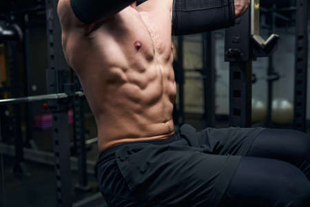 Close up of sportsman demonstrating his press