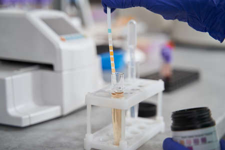 Lady doing medical research in medical laboratory