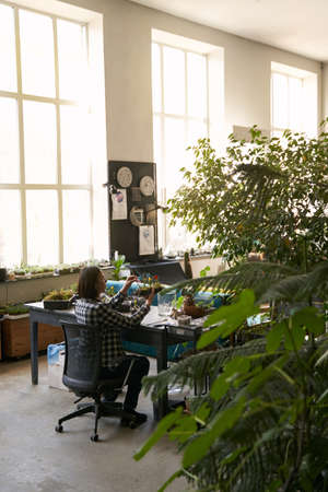 Professional designer working in the big workshop