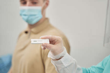 Man passing test to check virus at doctorの写真素材