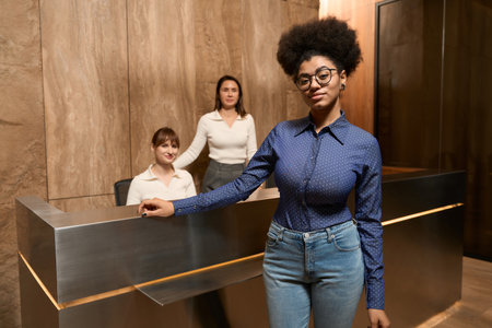 Portrait of lady waiting for service at receptionの写真素材