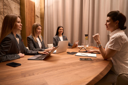 Council, medical worker talking with workers in hospitalの写真素材
