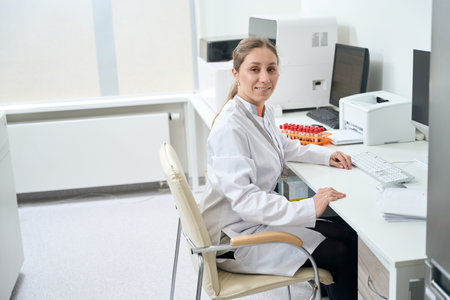 Woman doctor at the workplace in the diagnostic laboratoryの写真素材