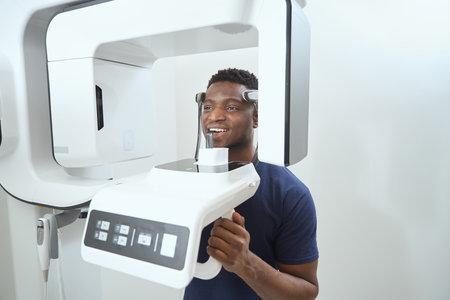 Adult man being examined in dental hospitalの写真素材