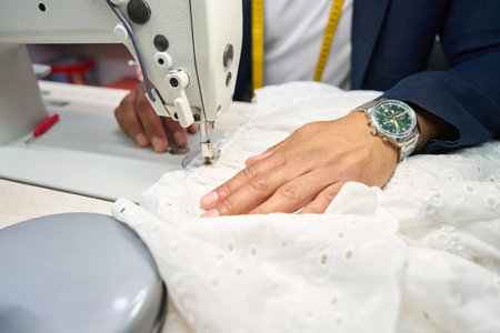 Sewer custom-making dress in his clothing studioの写真素材