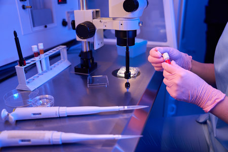 Lab researcher preparing biological material for storageの写真素材