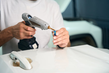 Process of using straightening gadgetsの写真素材