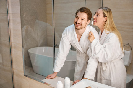 Young people in the bathroom doing their morning routine