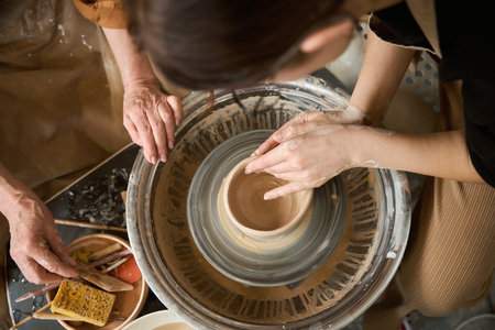 Pottery lesson in a ceramics studioの写真素材