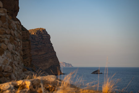 Serene coastal view of rocky cliffs and sea