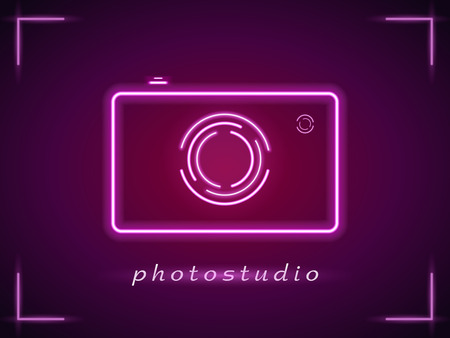 Neon photo camera sign. Photostudio neon banner. Luminous signboard camera, night advertisement neon cam. Pink neon light on dark purple background. Vector illustration EPS10のイラスト素材