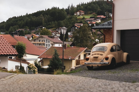 An old car on the street in a village in Bavaria.
