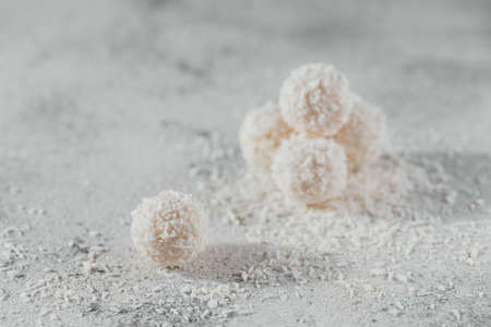 Coconut healthy sugarfree balls in coco flakes on white backgroundの写真素材