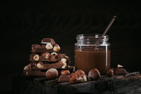 Homemade Chocolate Hazelnut Milk Spread on a dark Backgroundの写真素材