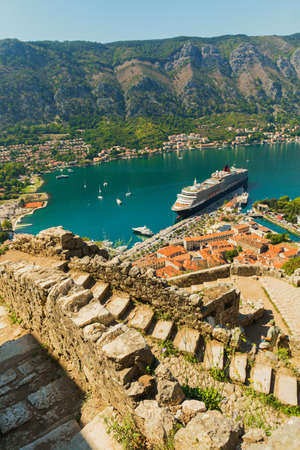Colorful landscape with boats in marina bay, sea, mountains, blue skyの写真素材